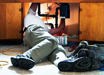 Walt is fixing a garbage disposal